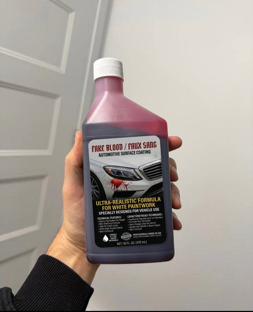 Flacon Pur Sang de 470 ml tenu à la main